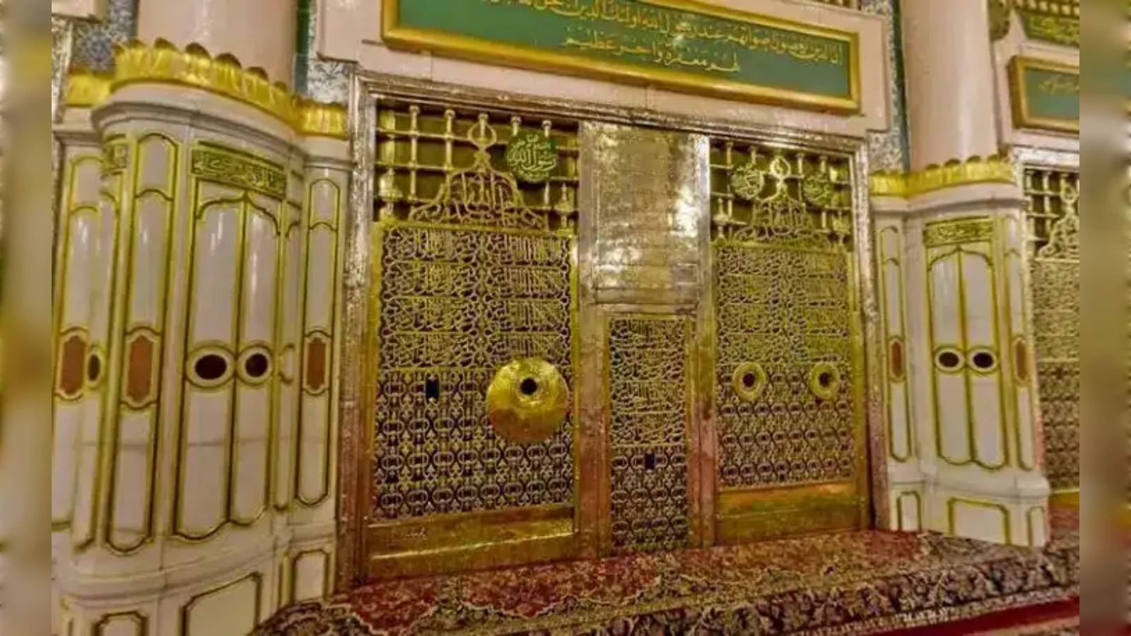 Inner sanctum of Prophet’s Mosque in Madinah featuring intricate gold gates and Islamic decor.