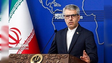 Iranian official denies US negotiations are moving from Oman to another location.