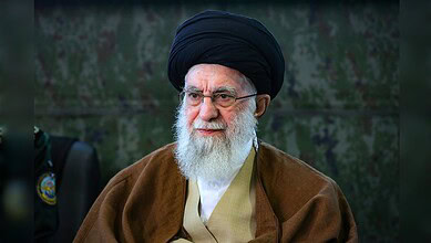 The image of Ali Khamenei, Iran’s Supreme Leader, wearing a black turban and glasses.