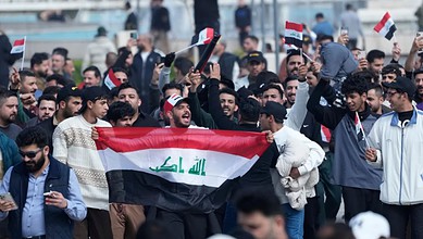 Iraqi traders protest against the imposition of customs duties on imported goods in Baghdad, Iraq, Sunday, Feb. 8, 2026. (AP Photo/Hadi Mizban)
