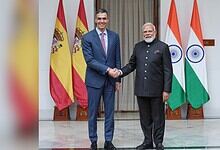 Prime Minister Modi and Spanish President Sanchez shake hands during AI collaboration talks.