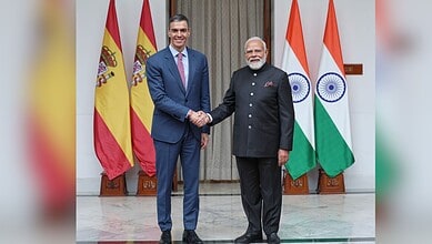 Prime Minister Modi and Spanish President Sanchez shake hands during AI collaboration talks.