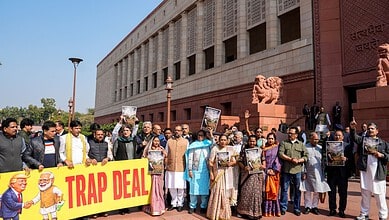 New Delhi: Opposition MPs stage a protest at the Parliament House complex during the Budget session, in New Delhi, Friday, Feb. 6, 2026. (PTI Photo/Salman Ali)