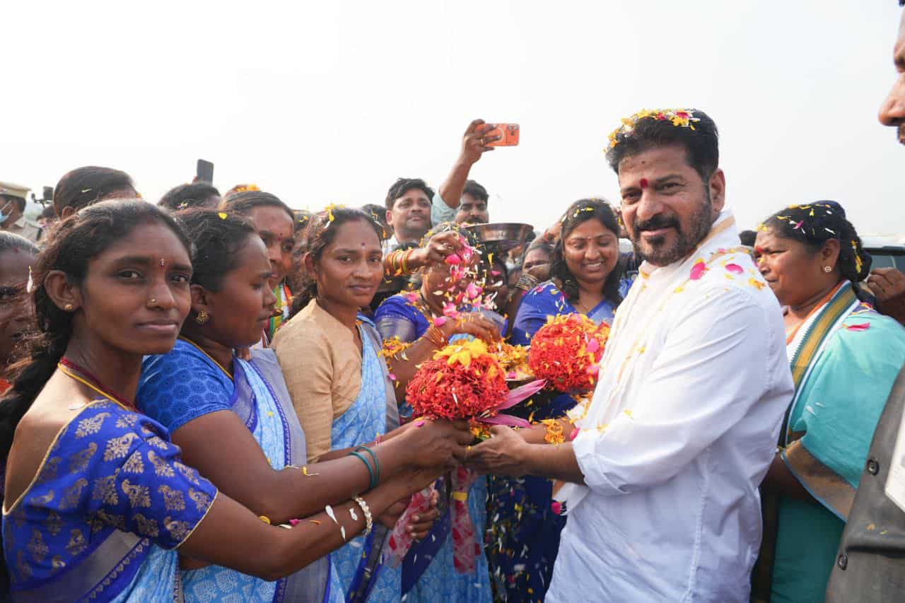 Image showing Telangana CM Revanth Reddy interacting with the public.