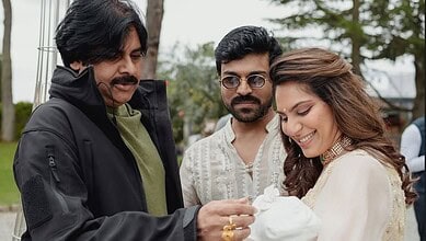 Ram Charan and Upasana with their newborn twins outdoors.