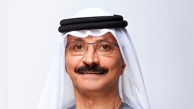 DP World CEO Sultan Ahmed bin Sulayem with traditional Middle Eastern attire.
