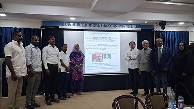 A group of attendees pose at the Dr. B.R. Ambedkar Resource Centre during a roundtable discussion on the Telangana Minority Welfare Budget.