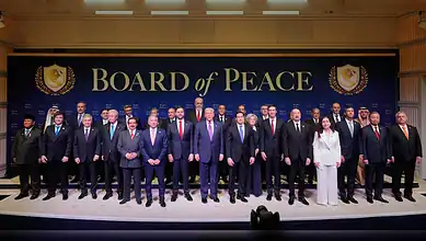 Group photo of officials and dignitaries at the Board of Peace event, showcasing leadership and collabora.