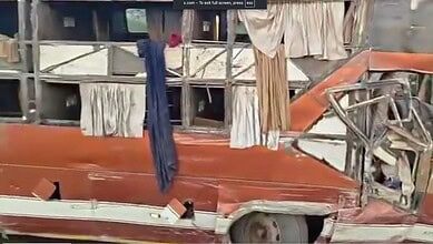 Overturned bus from Hyderabad after accident in Nizamabad.