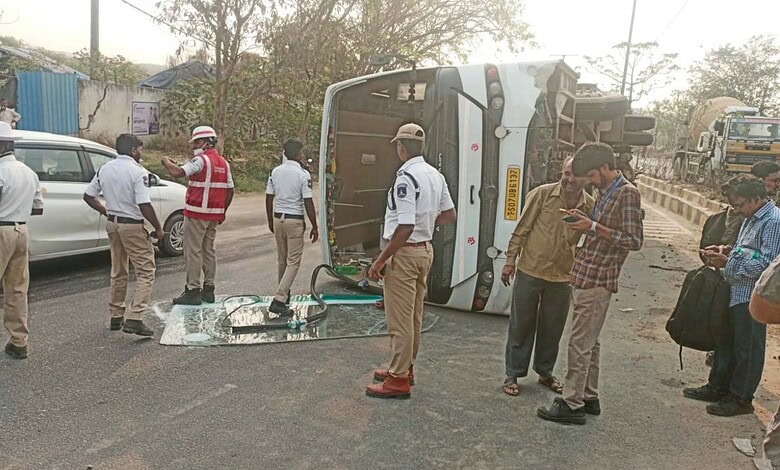 Bus carrying pharma employees overturns on Hyderabad road, causing injuries.