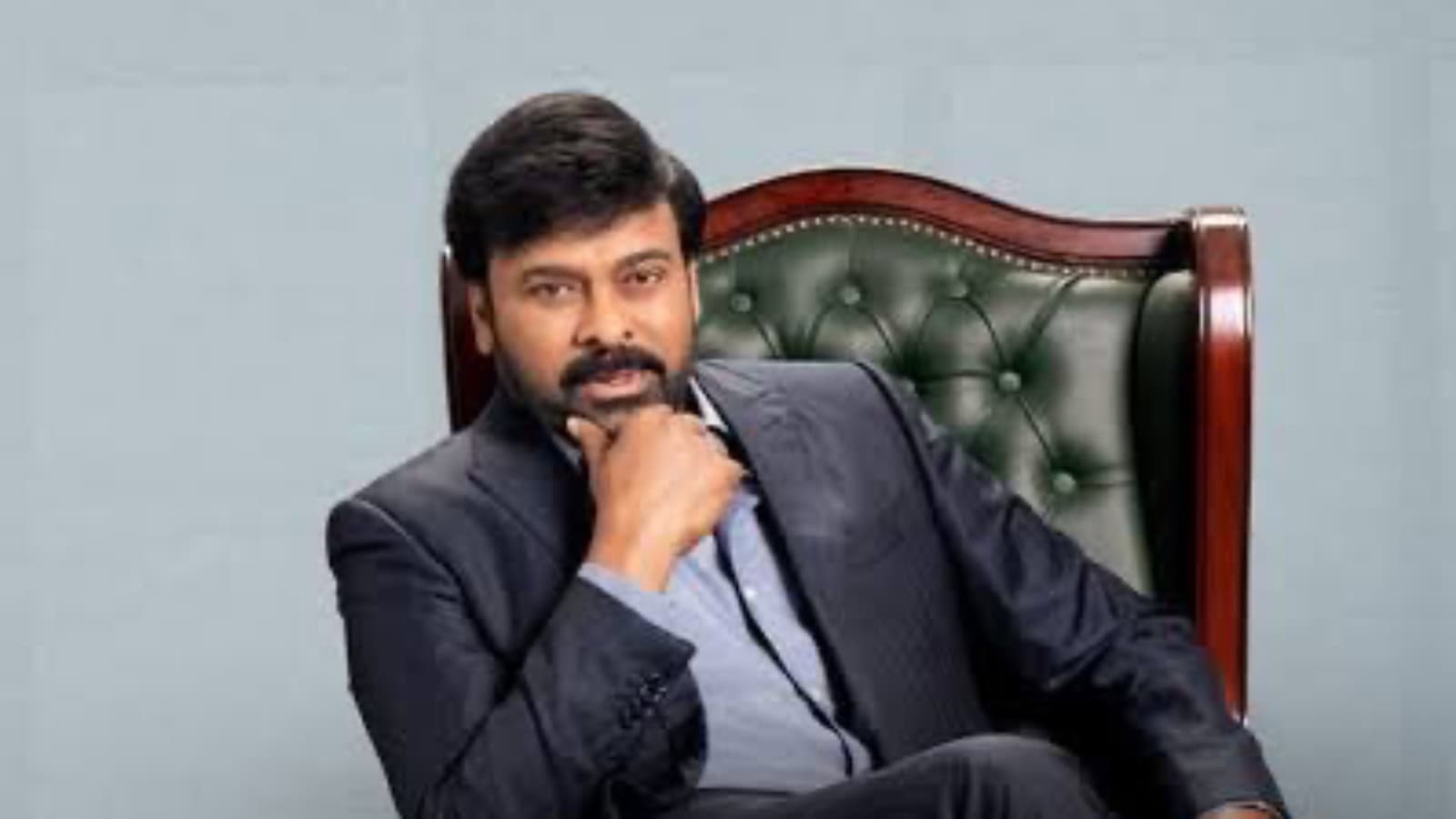 Chiranjeevi at award ceremony, receiving NTR garu honour, celebrating achievement.