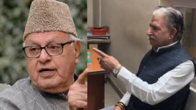 Kamal Singh Jamwal, who allegedly fired a shot targeting National Conference president Farooq Abdullah and Jammu and Kashmir Deputy Chief Minister Surinder Choudhary at a wedding function, sits at a police station after being detained, in Jammu on Wednesday, March 11.