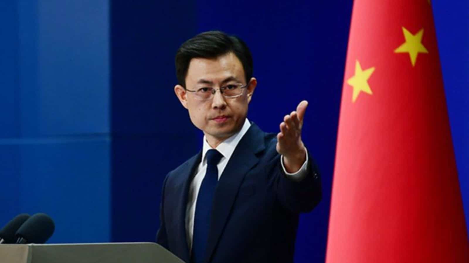 Chinese official announces USD 200K aid for victims of Iranian school bombing at press conference.