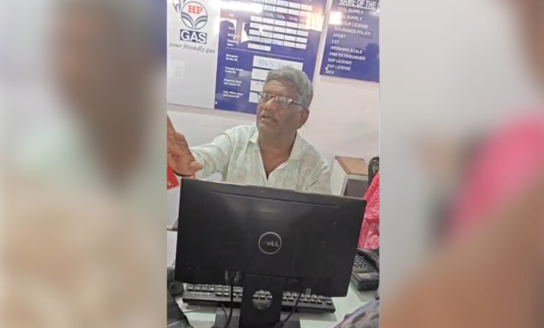 HP Gas employee deals with residents complaints over LPG booking