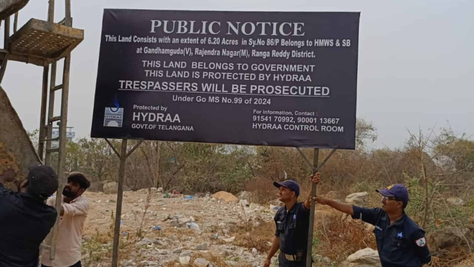 The image shows HYDRAA officials fencing 6.3 acre government land worth Rs 600 crore in Hyderabad's IT Corridor in Gandipet mandal of Rangareddy district on Monday, March 2, 2026.