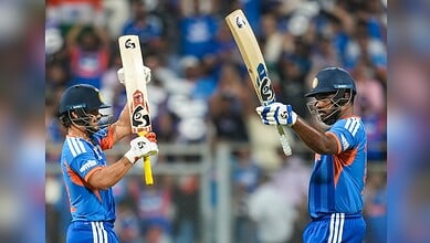 Sanju Samson celebrates his half century with Ishan Kishan during the ICC Men's T20 World Cup 2026 second semifinal cricket match between India and England at the Wankhede Stadium in Mumbai on Thursday, March 5.