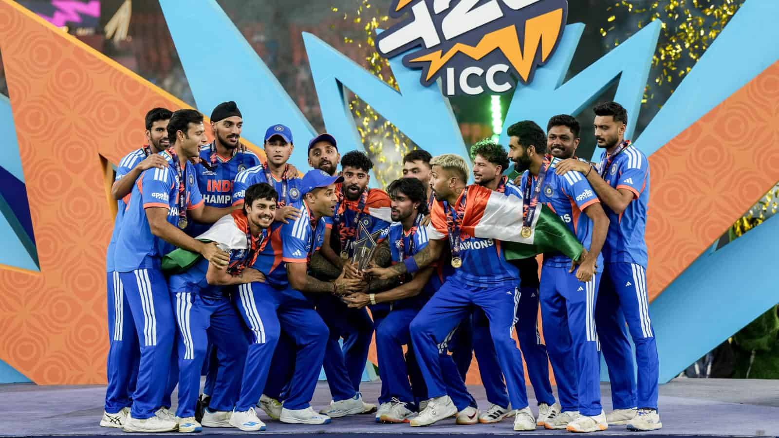 India cricket team celebrating ICC T20 World Cup victory with trophy.