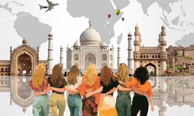 Women exploring Indian monuments, showcasing empowerment and travel influence across borders.