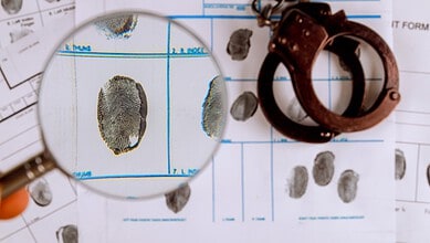 Forgery document and fingerprint analysis for criminal investigation.