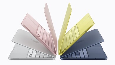 Colourful Apple MacBook laptops displayed in pink, yellow, white, and navy blue, highlighting affordabili.