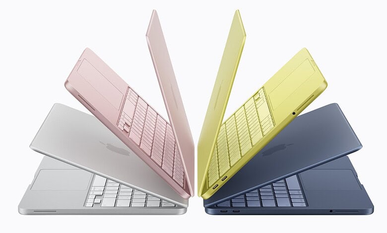 Colourful Apple MacBook laptops displayed in pink, yellow, white, and navy blue, highlighting affordabili.