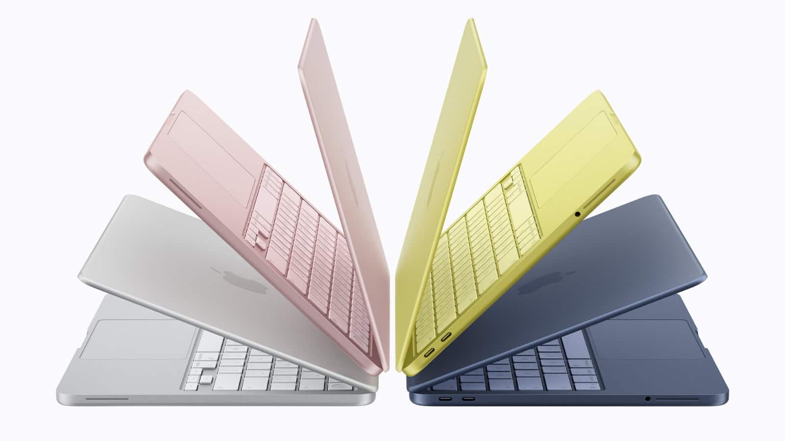 Colourful Apple MacBook laptops displayed in pink, yellow, white, and navy blue, highlighting affordabili.