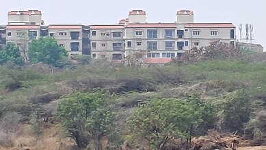 The image shows the view of Madhu Park Ridge apartments as seen from Bapu Ghat at Langar House on Tuesday, March 10.