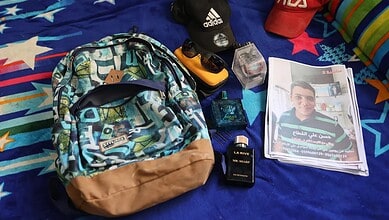 The belongings of 16-year-old Hassan, who went missing in Gaza. Photo: Wired
