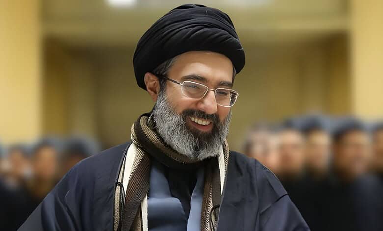 Mojtaba Khamenei, the new Supreme Leader, smiling during a formal event.