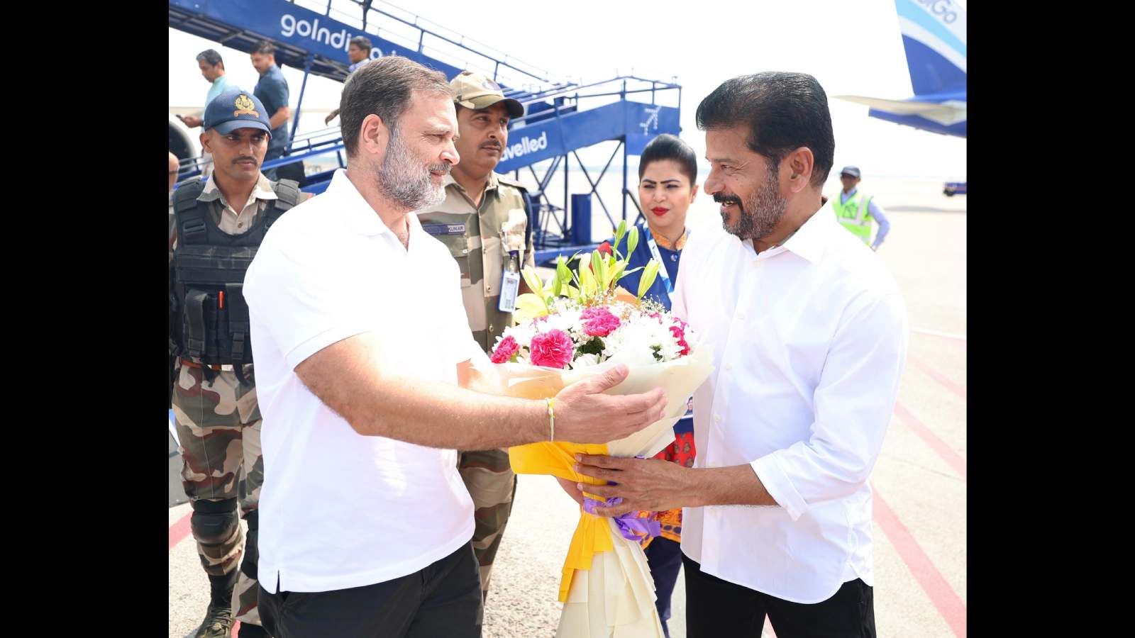 Rahul Gandhi arriving in Telangana for Congress training programme, exchanging flowers with a party membe.