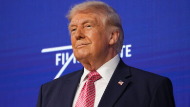 President Donald Trump takes the stage at the Future Investment Initiative Institute's summit, Friday, March 27, 2026, in Miami Beach, Fla