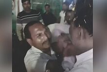 Clash between individuals during a viral non-veg photo incident at Kanpur temple, causing chaos and mob v.