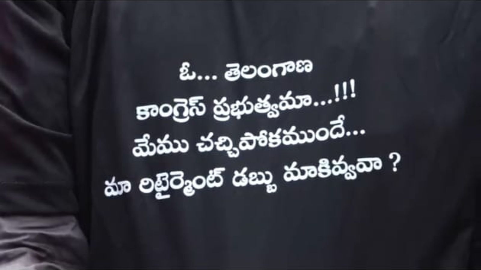 The image shows a retired employee wearing a black T-shirt while protesting in Karimnagar demanding the state government to pay pending retirement benefits, on Tuesday, March 31.