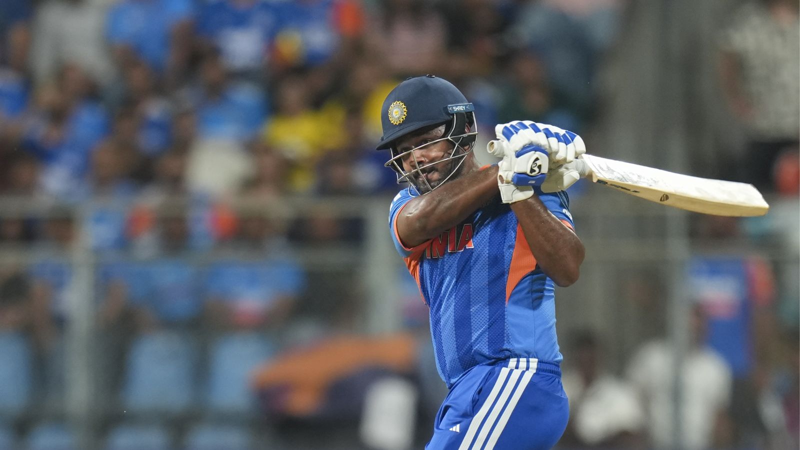 India vs England cricket match, T20 World Cup final, player in action.