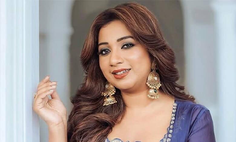Shreya Ghoshal, a renowned Indian Idol singer, captured in a traditional outfit, highlighting her musical.