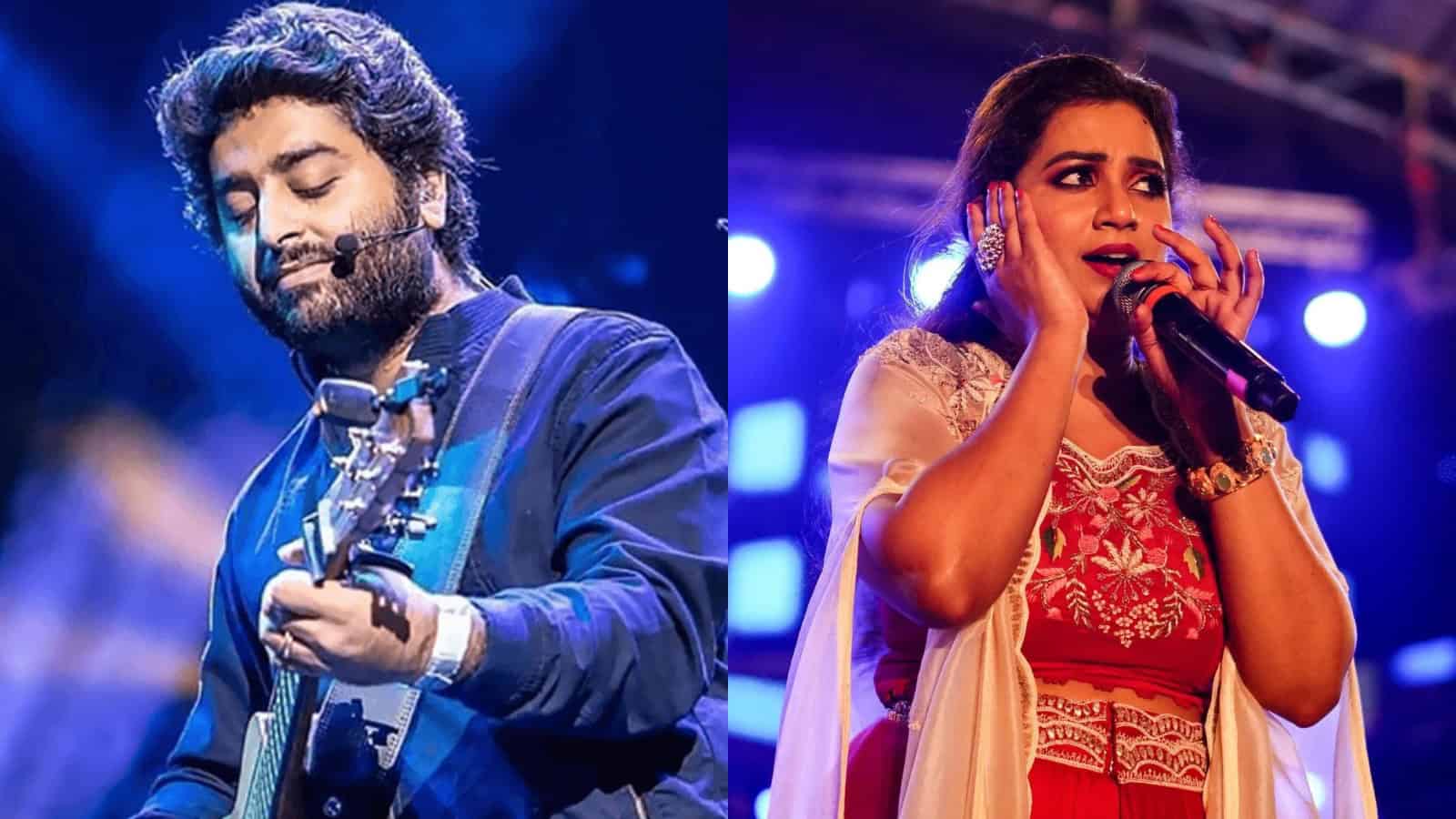 Arijit Singh and Shreya Ghoshal singing on stage during a concert.