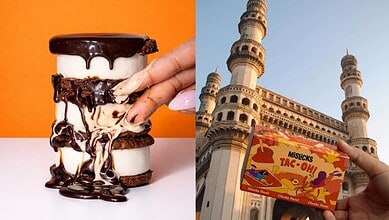 Close-up of a hand holding a messy ice cream sandwich with chocolate and vanilla ice cream, and a histori.
