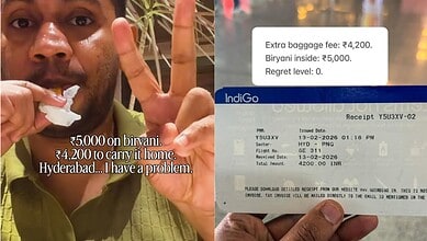 Chef with a peace sign holding a receipt for Rs 4200 for Hyderabadi biryani.