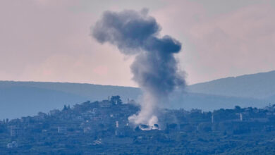 Smoke rises from an Israeli airstrike that hit Zibbikin village as seen from Tyre city, Lebanon