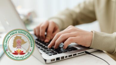 Image shows a person typing on a laptop keyboard alongside the official seal of the Telangana Public Service Commission (TGPSC).