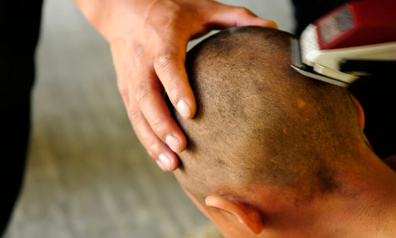 Teacher tonsures student for having long hair in Hyderabad, parents stage protest