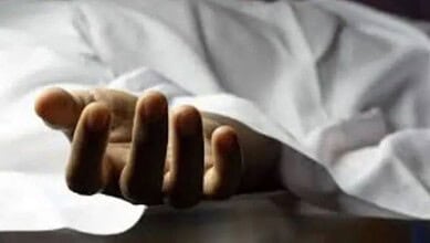 Distressed hand of a person lying in bed, symbolising tragedy and loss in Madhya Pradesh.