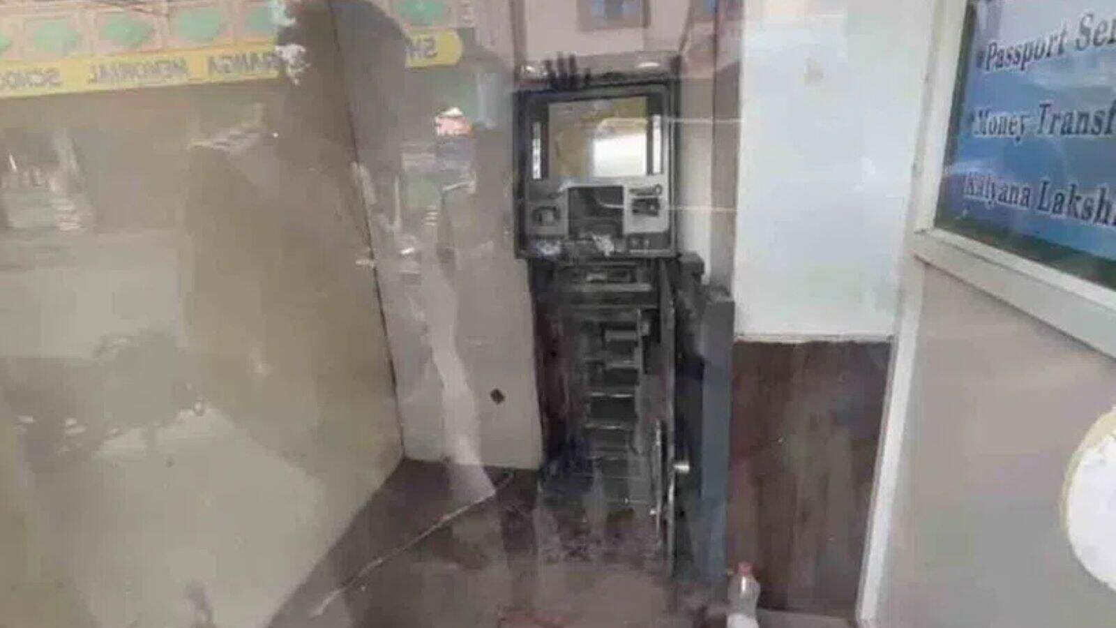 Damaged ATM machine after theft in Sangareddy, Telangana, with cash missing.