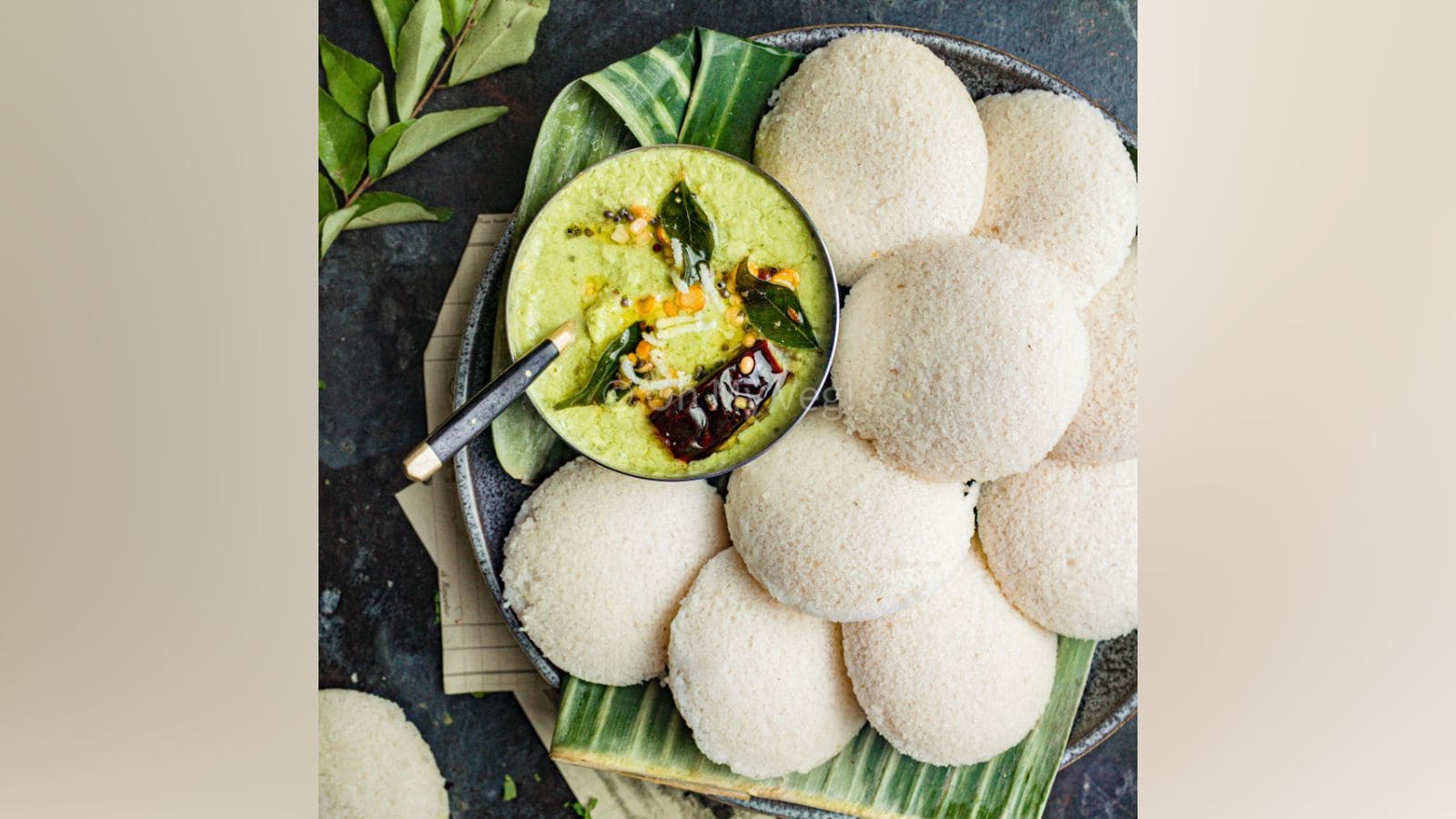 Traditional Kerala idlis served with chutney, postponed event due to Ramzan celebrations.