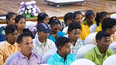 Maoists surrender with 124 weapons before Telangana Chief Minister, highlighting peace efforts.