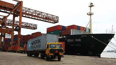 Ship and cargo containers at the port in Kerala, India.
