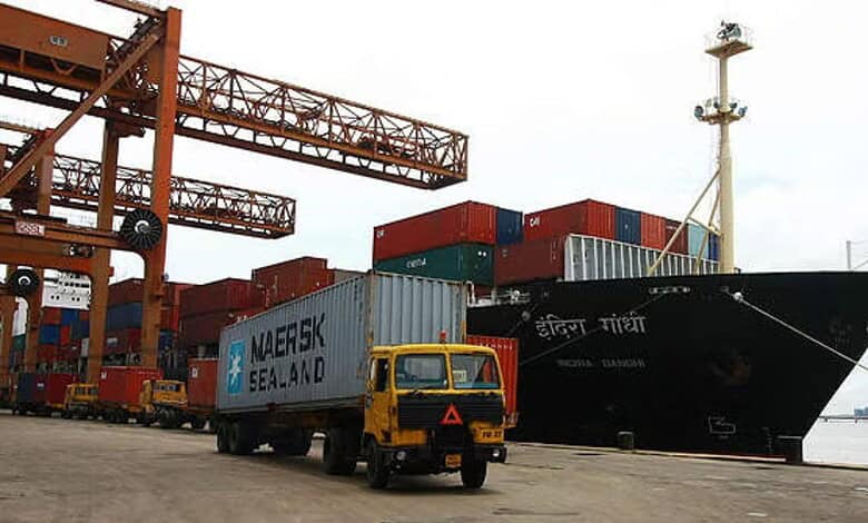 Ship and cargo containers at the port in Kerala, India.