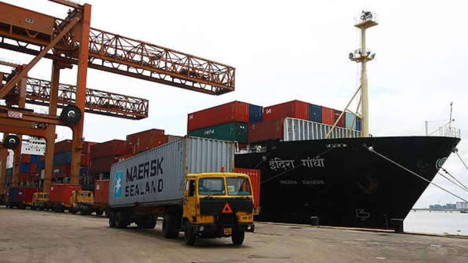 Ship and cargo containers at the port in Kerala, India.