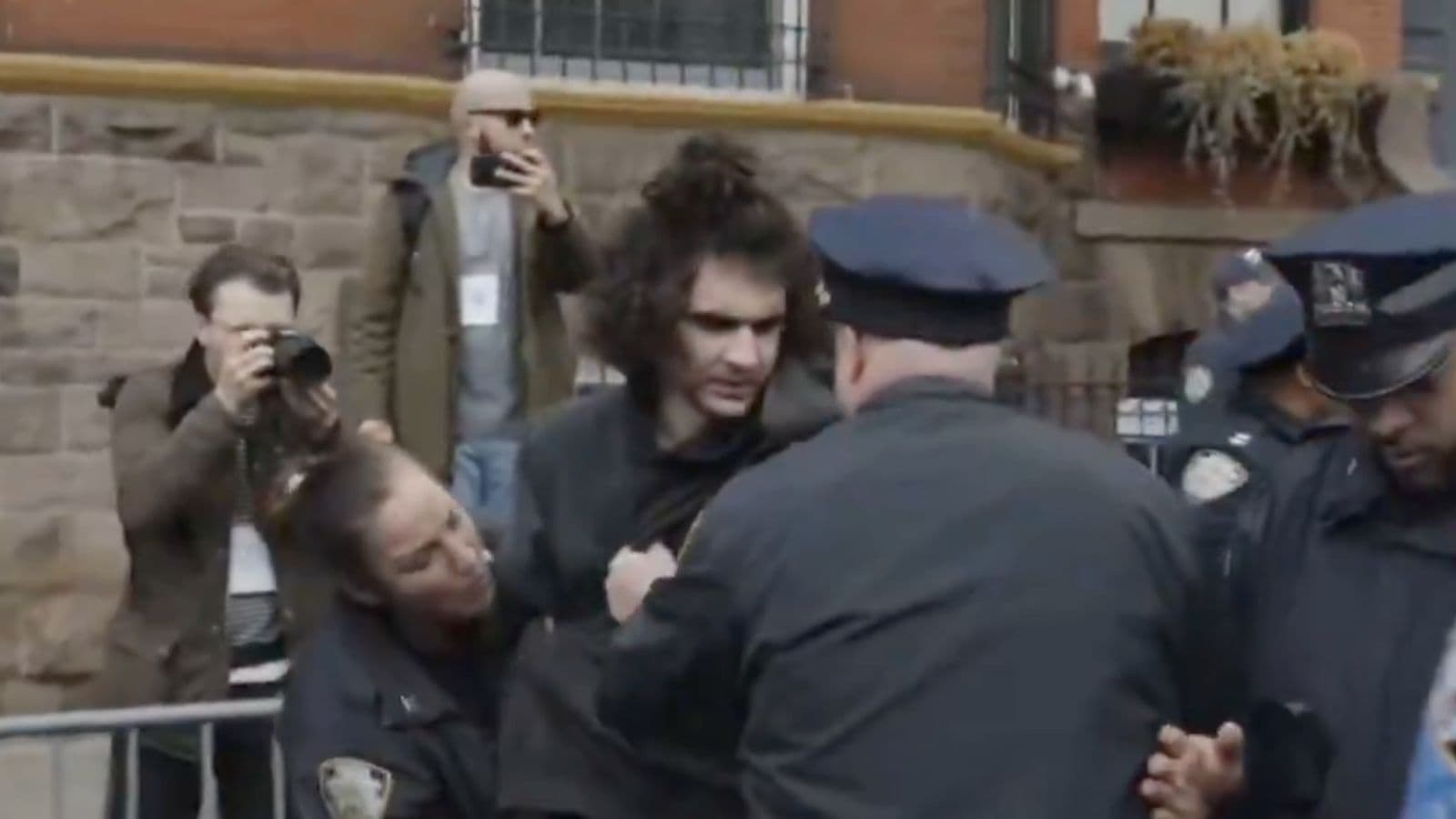 Device thrown at anti-Islam protest in New York City, police investigate incident involving protester and.