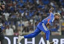 India cricket player celebrating a wicket during a match.